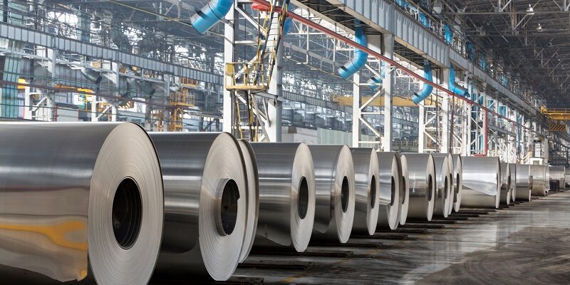 Row,Of,Rolls,Of,Aluminum,Lie,In,Production,Shop,Of